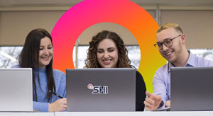 team at laptops